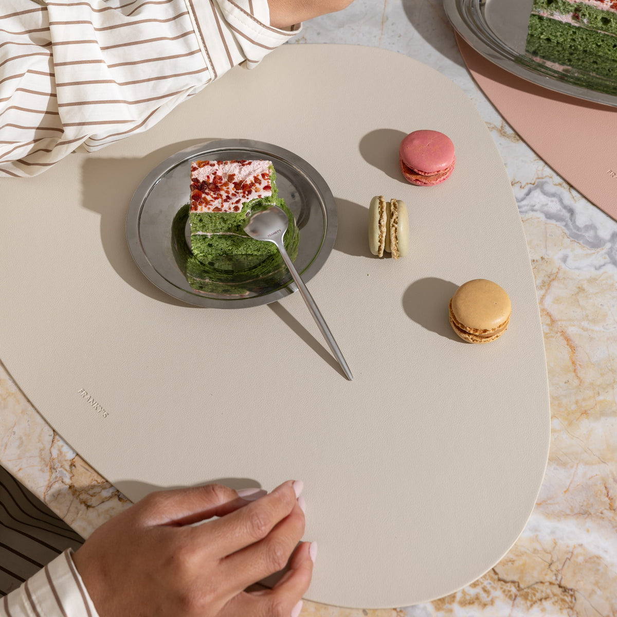 FRANKY'S Sweden Placemat in Beige, served with Pistachio Cake